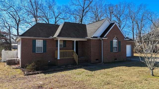 view of front of house with central AC unit, a garage, and a front yard