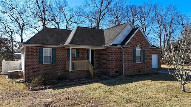 view of front of home with a garage, central AC unit, and a front yard