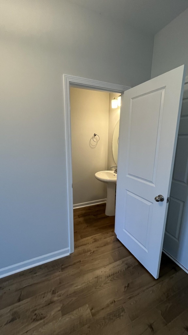 bathroom featuring wood-type flooring