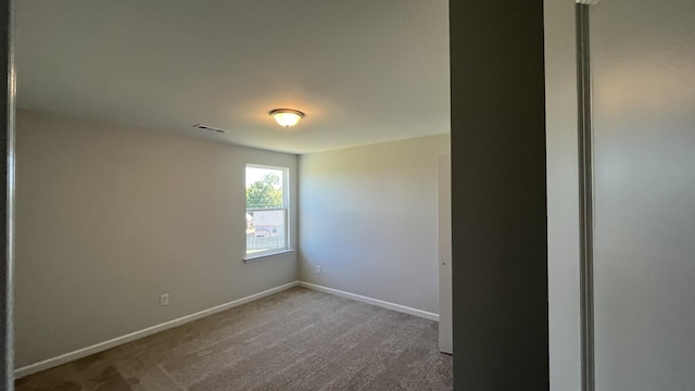 empty room with carpet floors