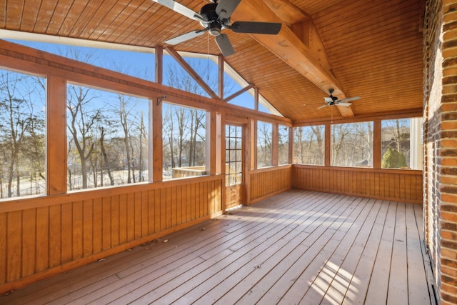 unfurnished sunroom with vaulted ceiling with beams, wooden ceiling, and ceiling fan