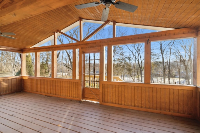 unfurnished sunroom featuring wood ceiling, vaulted ceiling, and ceiling fan