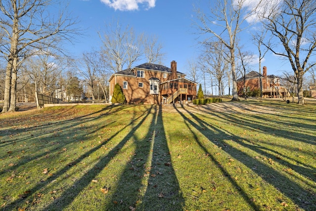 view of yard featuring a wooden deck