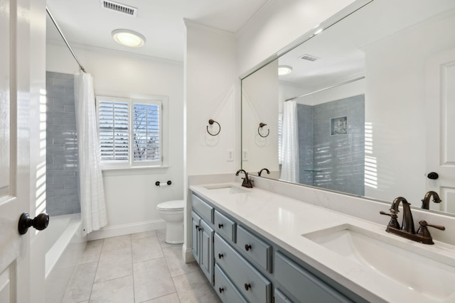 full bathroom with ornamental molding, tile patterned floors, toilet, and vanity