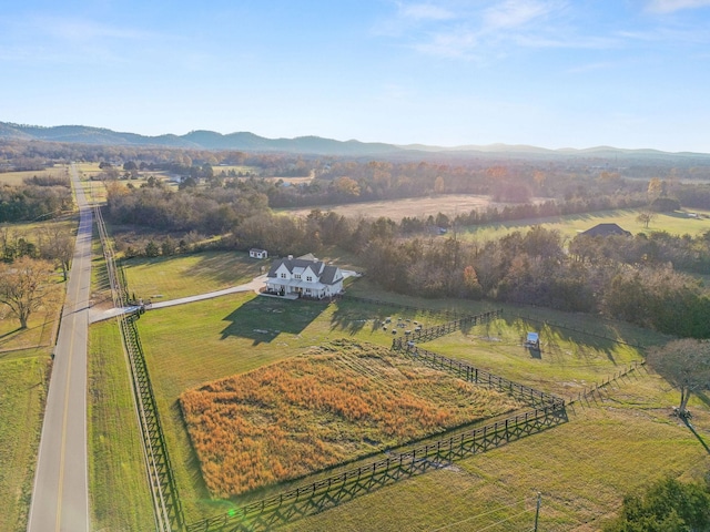 birds eye view of property featuring a rural view and a mountain view