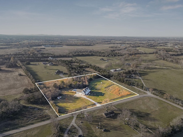 bird's eye view with a rural view