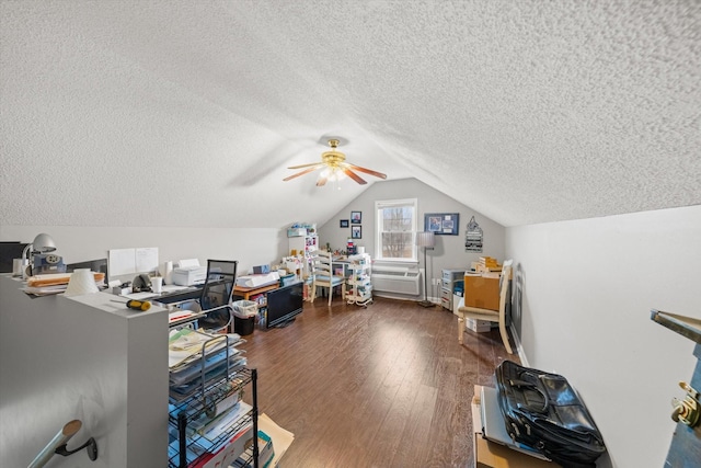 home office with ceiling fan, dark wood-type flooring, a textured ceiling, and vaulted ceiling