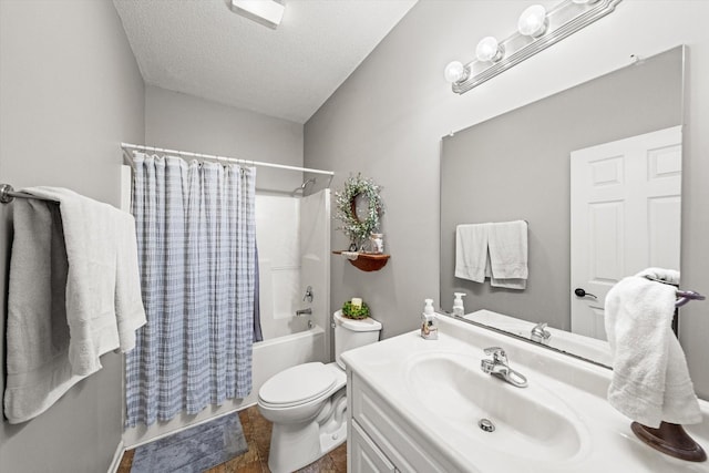 full bathroom featuring vanity, toilet, shower / bath combination with curtain, and a textured ceiling