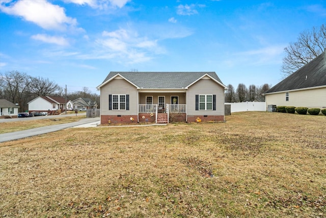 view of front of property featuring a porch and a front lawn