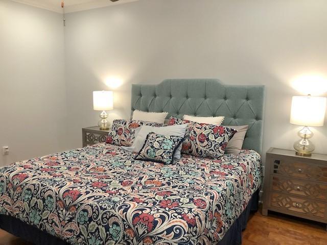 bedroom featuring hardwood / wood-style flooring