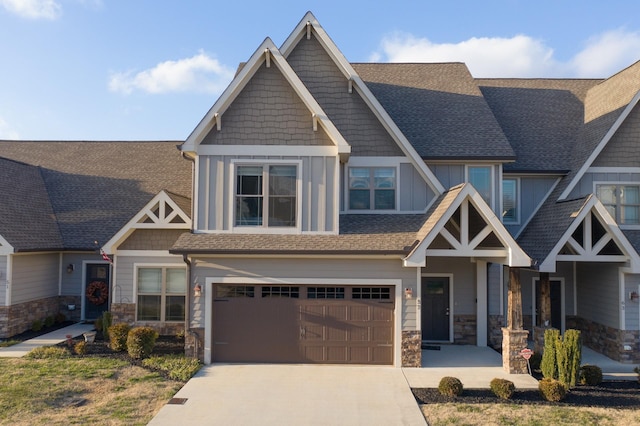 craftsman-style home featuring a garage and covered porch