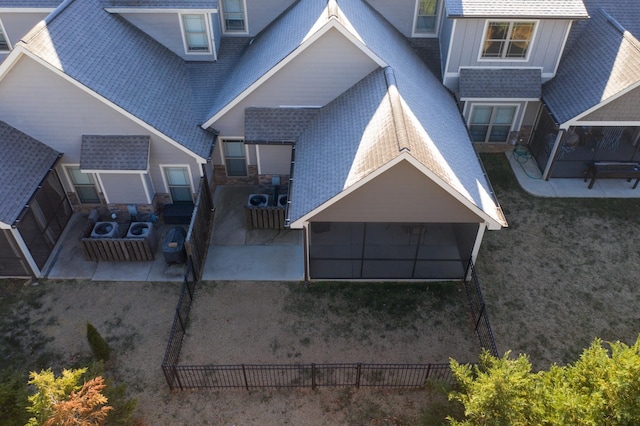 back of property featuring an outdoor living space and a patio