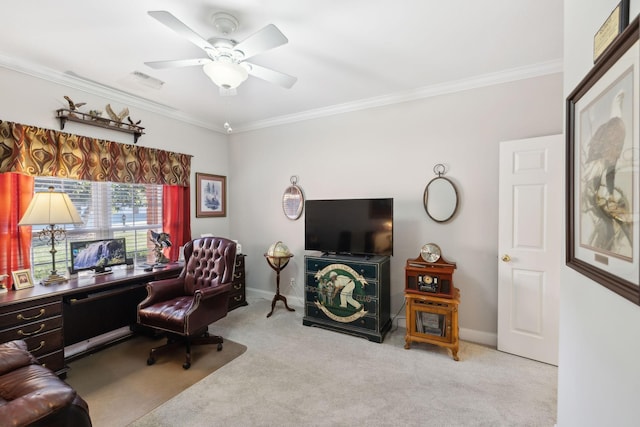 home office featuring crown molding, light colored carpet, and ceiling fan