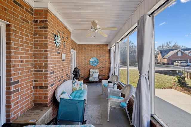 sunroom / solarium with ceiling fan