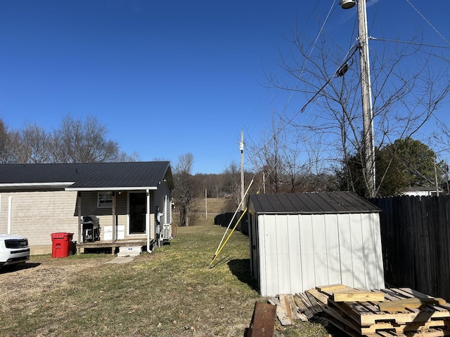 exterior space featuring a shed