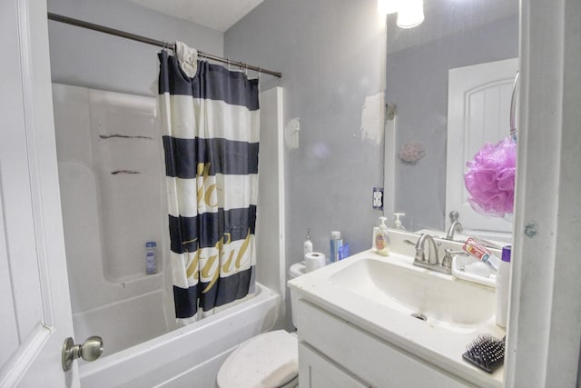 full bathroom with vanity, shower / tub combo with curtain, and toilet