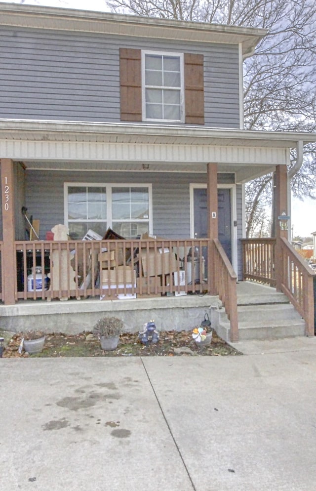 exterior space featuring covered porch