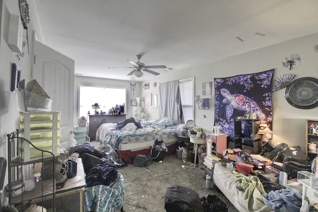 bedroom featuring ceiling fan and carpet flooring