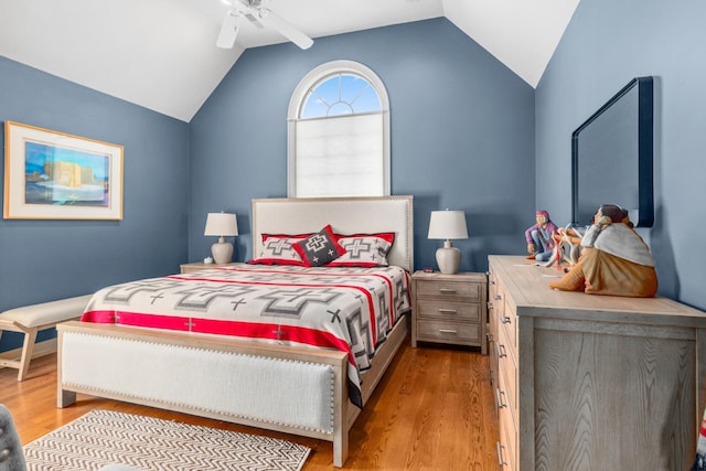 bedroom featuring vaulted ceiling, ceiling fan, and light hardwood / wood-style floors