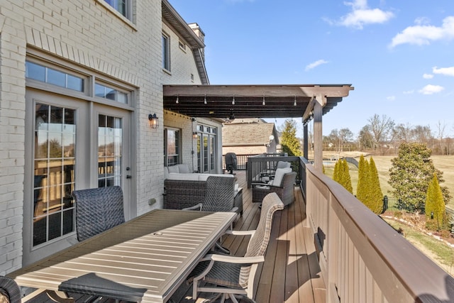 wooden deck featuring an outdoor living space