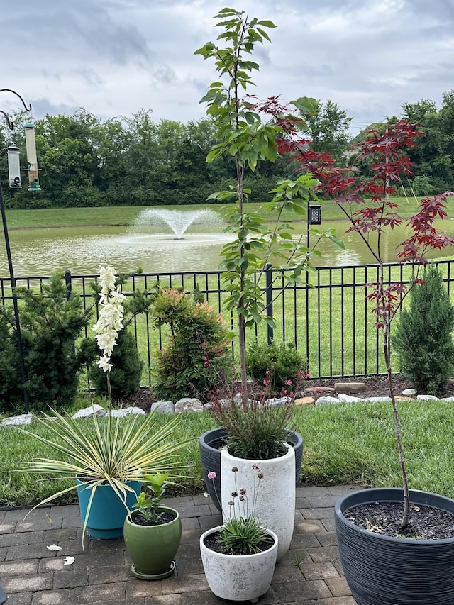 view of patio / terrace featuring a water view