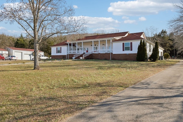 view of front of home featuring a front lawn and a porch