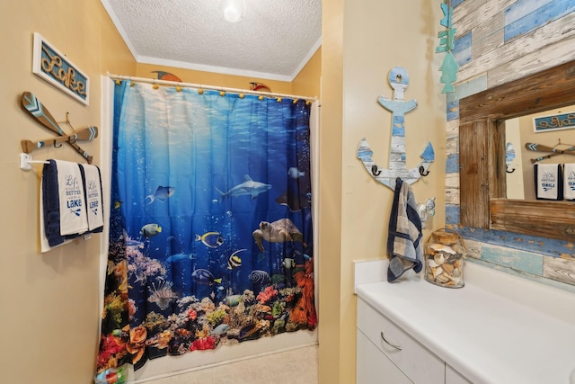 bathroom featuring ornamental molding, a shower with shower curtain, a textured ceiling, and wood walls