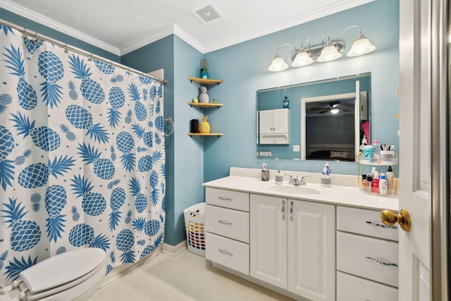 bathroom with vanity, toilet, crown molding, a textured ceiling, and a shower with curtain