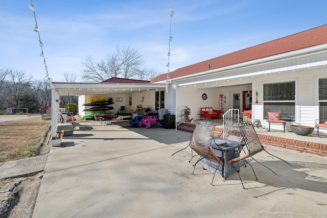 rear view of property with a patio area