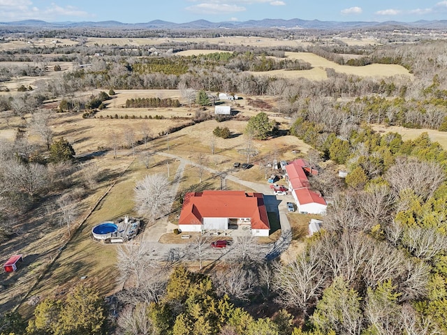 drone / aerial view featuring a mountain view