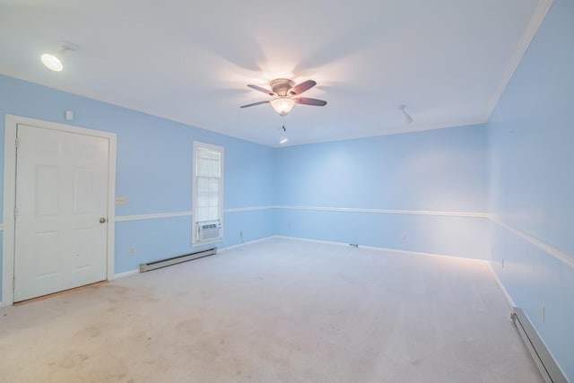 spare room with ceiling fan, crown molding, light carpet, and baseboard heating