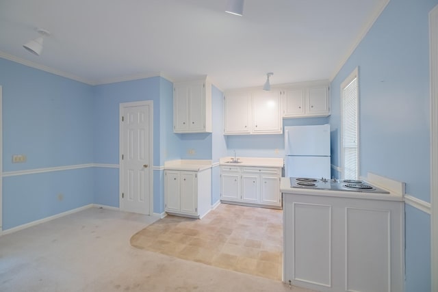 kitchen with crown molding, light carpet, electric stovetop, white fridge, and white cabinets