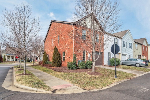 view of property exterior with a garage