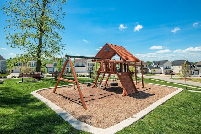 view of playground with a yard