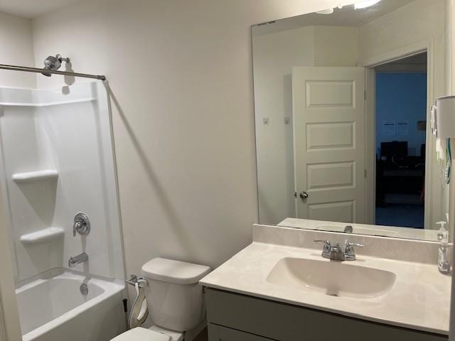 full bath with toilet, shower / washtub combination, and vanity