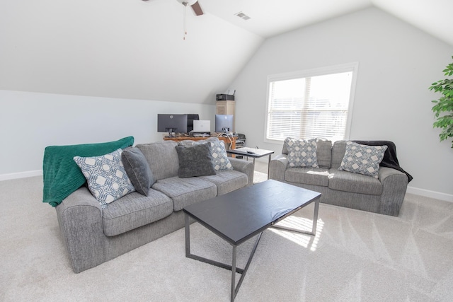 carpeted living room with lofted ceiling and ceiling fan