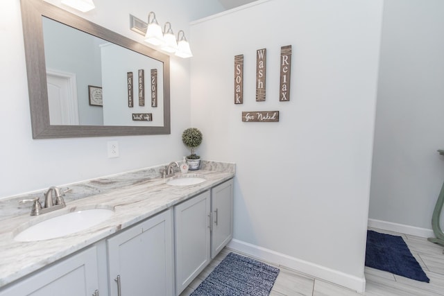 bathroom featuring vanity and tile patterned flooring