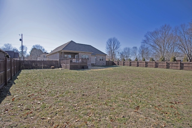 view of yard featuring a deck