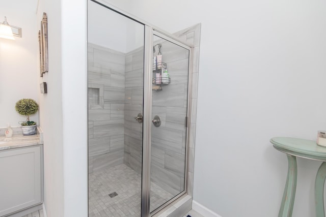 bathroom with vanity and an enclosed shower