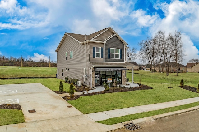 view of front of house with a front lawn