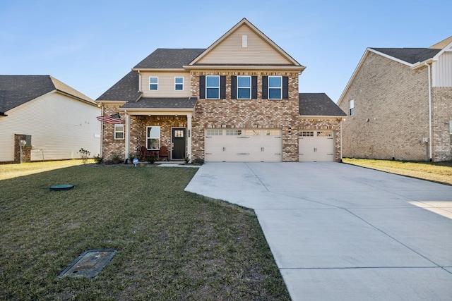 view of front of home featuring a garage and a front yard