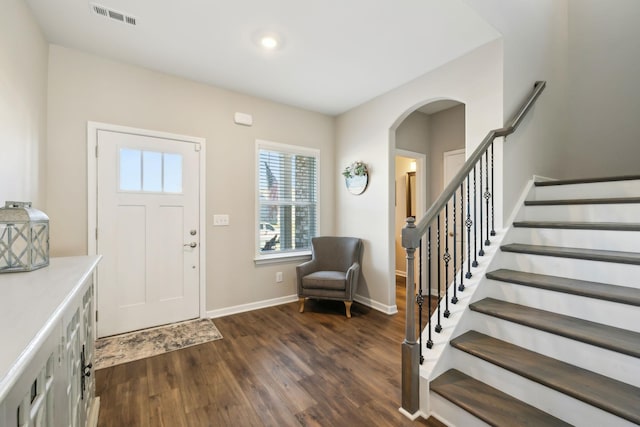 foyer featuring dark wood-type flooring