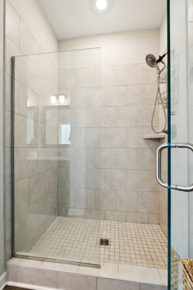 bathroom featuring an enclosed shower