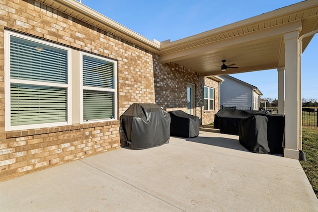 view of patio / terrace featuring ceiling fan and grilling area