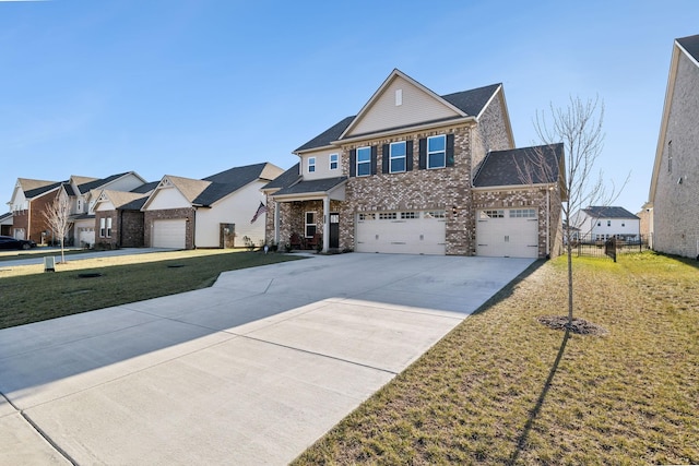 front of property with a garage and a front lawn