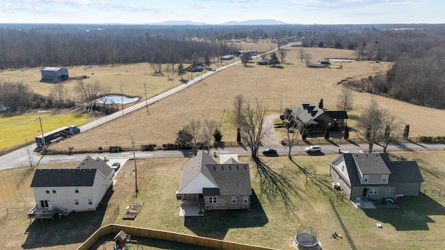 birds eye view of property featuring a mountain view and a rural view