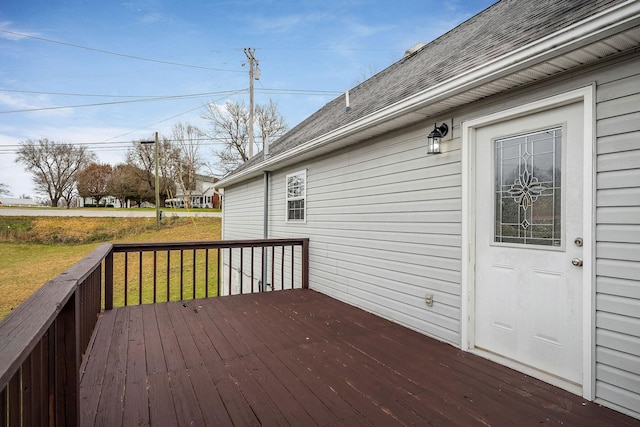 deck featuring a lawn