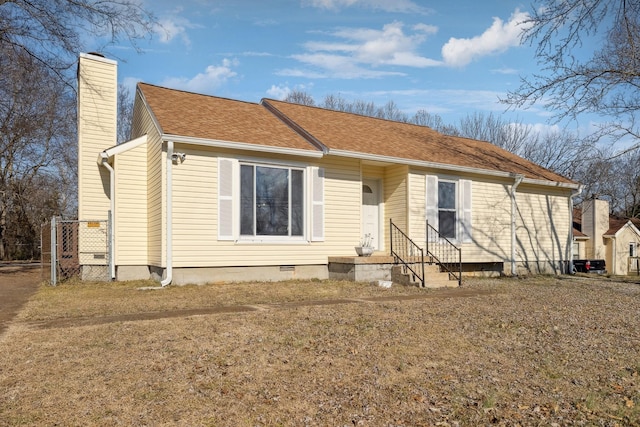 view of front of property with a front lawn