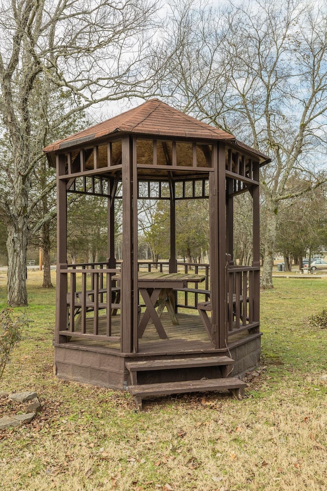 exterior space with a gazebo and a yard