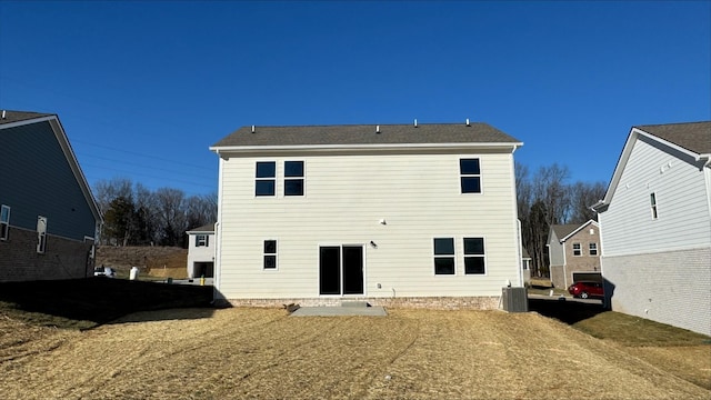 back of property with central AC unit